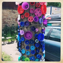 Colorful caps on a pole, I love this town!